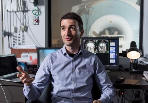 Researcher Dobromir Rahnev, who led the study, sits in the Georgia Tech control room of a functional MRI scanner much like the one used at the University of California, Berkeley for experiments on the frontal cortex's role in creating vision.