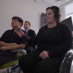 Cassie Mitchell talks with colleagues.